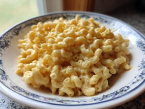 A close-up of a bowl filled with creamy 3 ingredient stovetop mac and cheese.